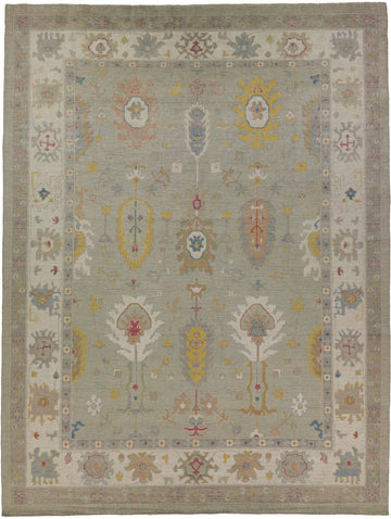10.6 x 14 hand knotted light green oriental rug with multiple bright colors.