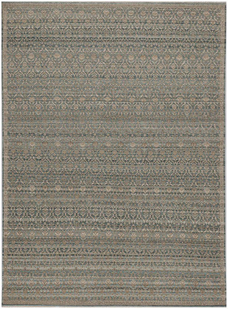 Hand-knotted green wool rug with earthy accents, all-over pattern, made in India, durable and easy to maintain.