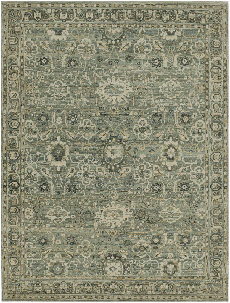 9x12 distressed green wool rug with floral design and vintage Persian Turkish inspired pattern.