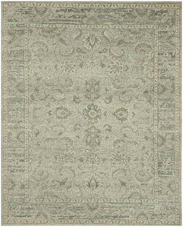 Light silver oriental Turkish Oushak wool rug with grey blue border and muted floral design in eight by ten size