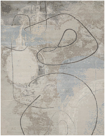 Hand knotted abstract wool and silk rug in blue with whimsical swirl pattern and grey beige accents 9' x 12' size