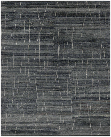 8x10 graphite blue Moroccan Berber shag wool rug with ombre grey and brown undertones.