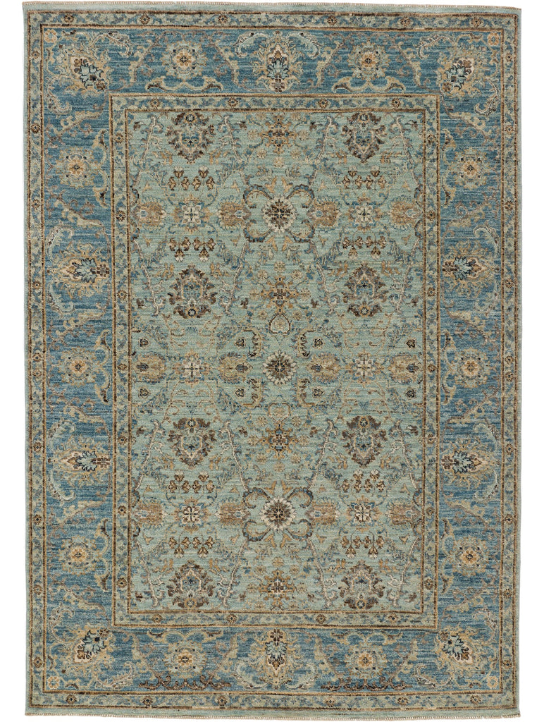 Hand knotted 5x7 cyan rug with robins egg blue wool and beige accents.