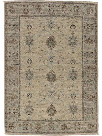 5x7 traditional greige rug with blue flowers and brown accents.