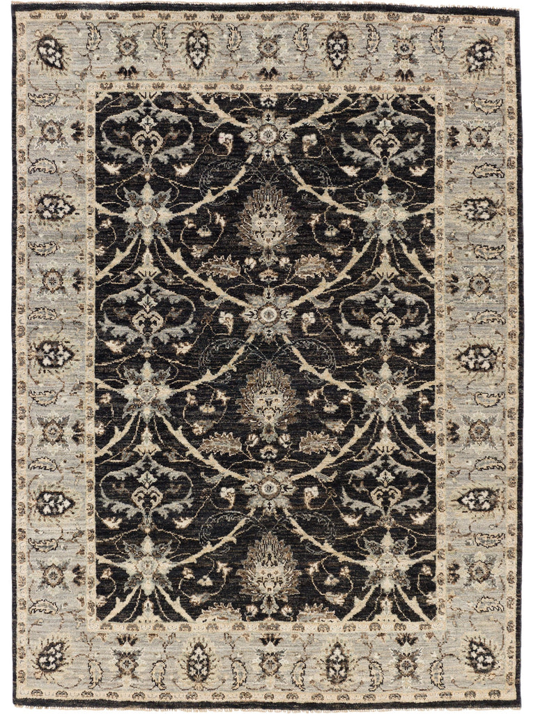 5x7 black rug with floral chain design and accent brown and grey.