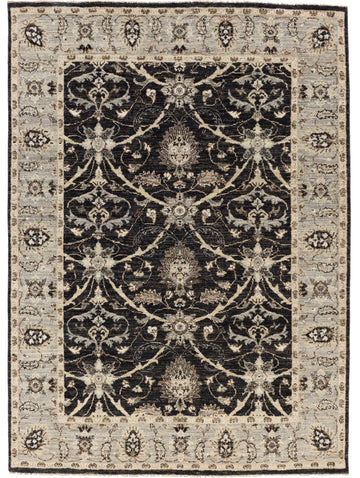 5x7 black rug with floral chain design and accent brown and grey.