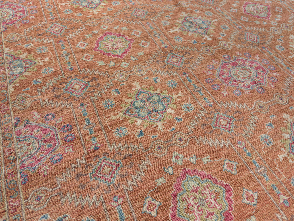 8 x 10 hand knotted luxury orange clay wool rug with multi colors.