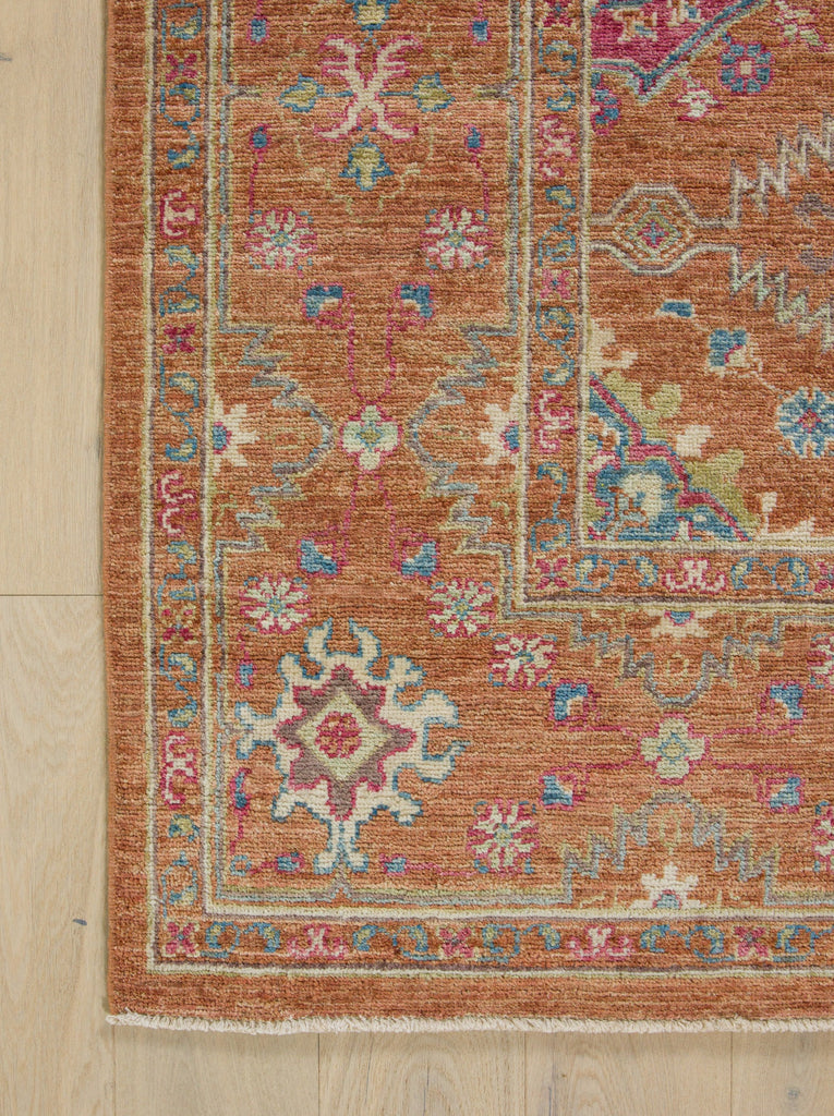 New orange Persian rug with bright lime green, blue and strawberry.
