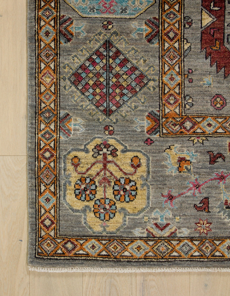 8x10 multi color grey tribal rug with yellow, berry red, burgundy, orange, ivory and more.