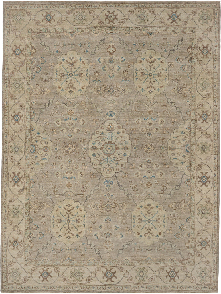 Roya Rugs hand knotted 8x10 pewter oriental rug made of wool with neutral ivory, blue, light green, brown and grey accents in a medallion design.