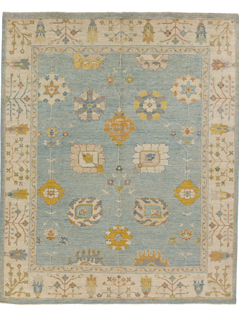 Roya Rugs hand knotted 8x10 rug in light blue and saffron yellow.