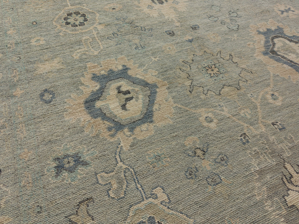 8x10 hand knotted oushak rug in mint grey, indigo and beige.