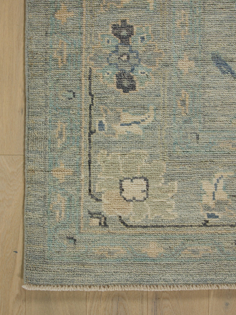 Hand knotted 8x10 oushak rug with mint grey, green and indigo.