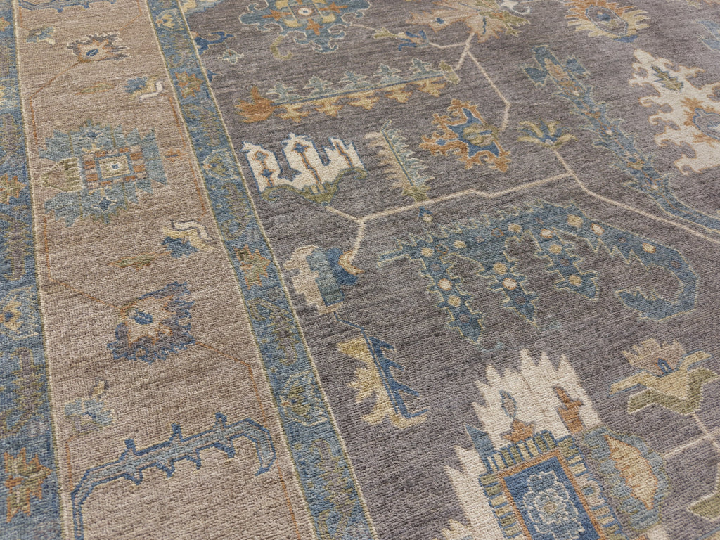 Dark grey and beige tribal Persian hand knotted rug with wool and green.