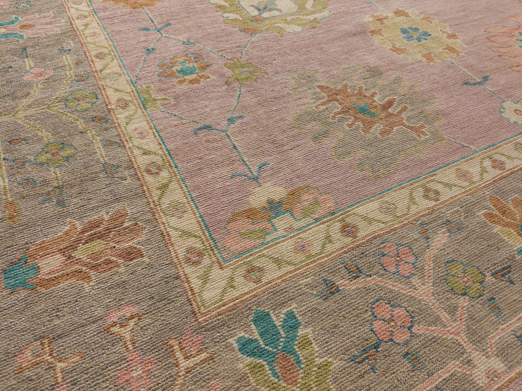 Roya Rugs 9x12 hand knotted wool lilac oushak rug with bright turquoise, navy, lilac and warm grey.