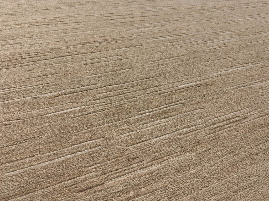 Off-white linear rug with mocha light brown and coarse wool and viscose rustic texture.