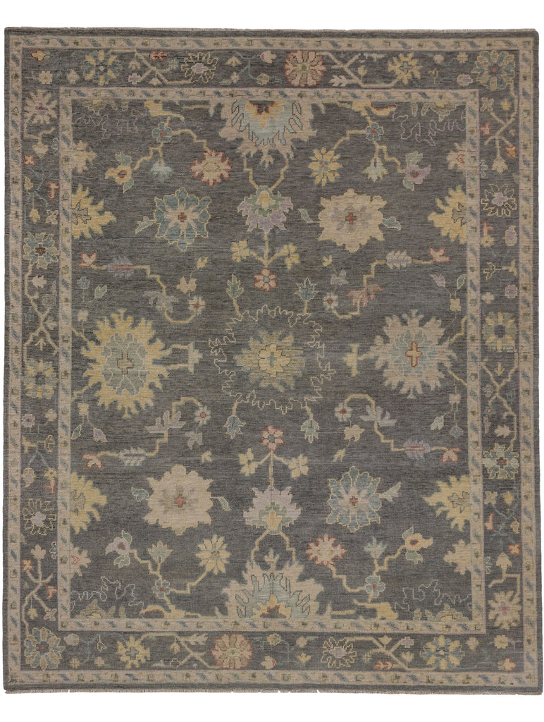 Roya Rugs hand knotted colorful light grey wool modern Oushak rug with lilac, coral, green, beige and blue accents.
