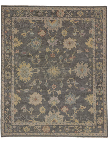 Roya Rugs hand knotted colorful light grey wool modern Oushak rug with lilac, coral, green, beige and blue accents.