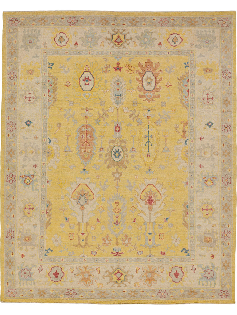 Roya Rugs hand knotted 8x10 colorful vibrant yellow oriental rug with wool and teal, coral and blue accents.