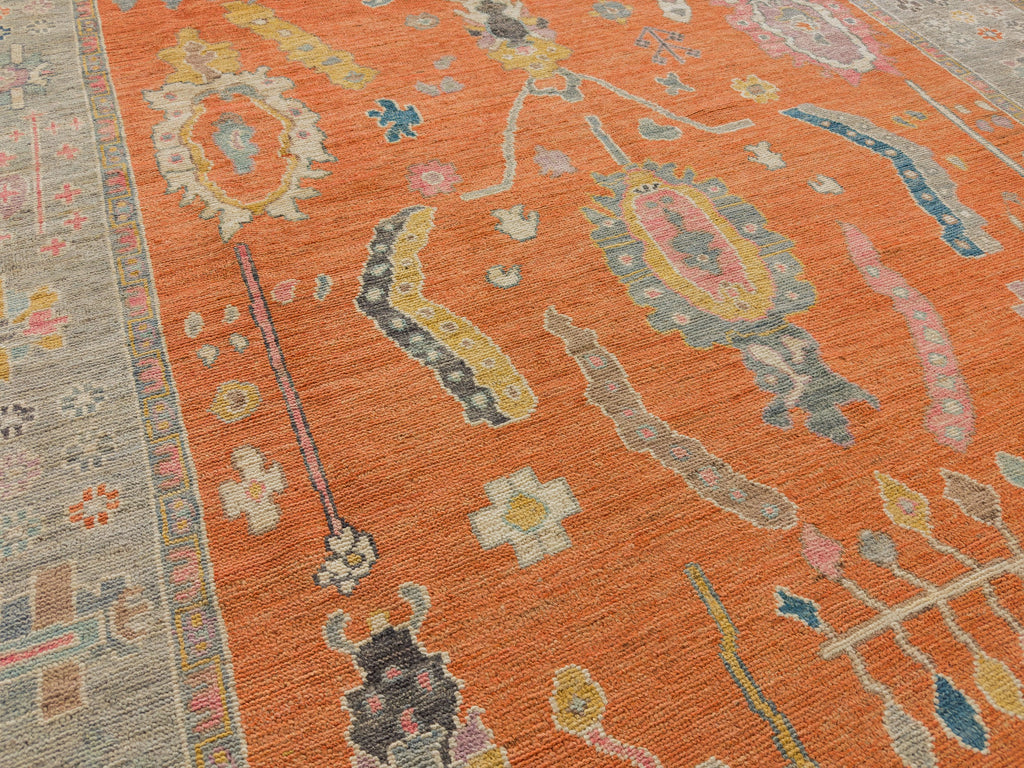 Orange and grey oriental rug hand knotted Turkish oushak knot of wool with brown, pink, lavender, gold and blue accents.