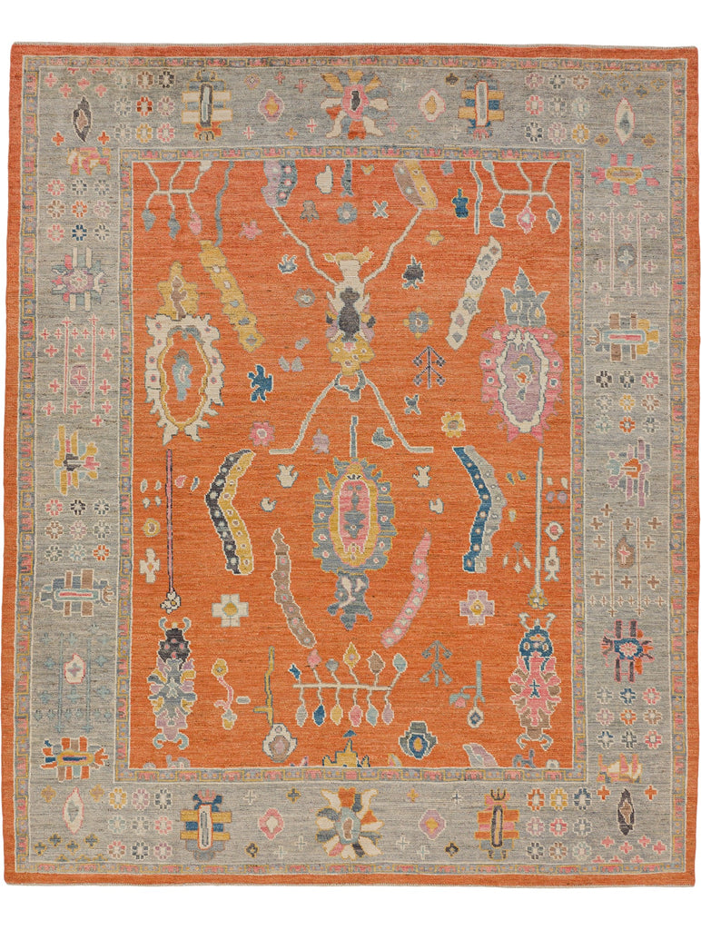 Roya Rugs wool hand knotted 8x10 colorful orange oriental rug with gold, pink and purple accents.
