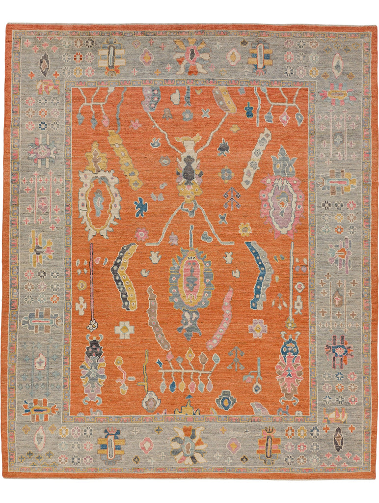 Roya Rugs wool hand knotted 8x10 colorful orange oriental rug with gold, pink and purple accents.