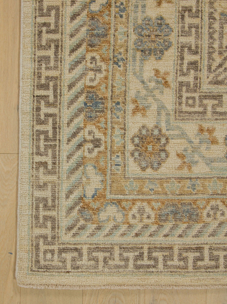 Roya Rugs Hickory NC hand knotted neutral oriental rug 8x10 in ivory and caramel brown.