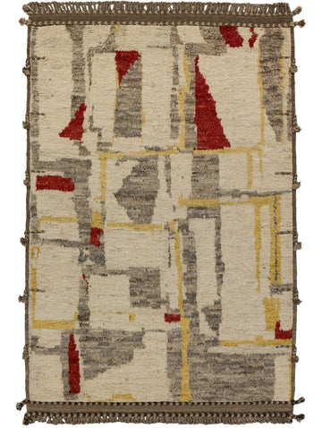 Roya Rugs colorful moroccan rug in vibrant red, earth tone brown, gold and shag wool pile.