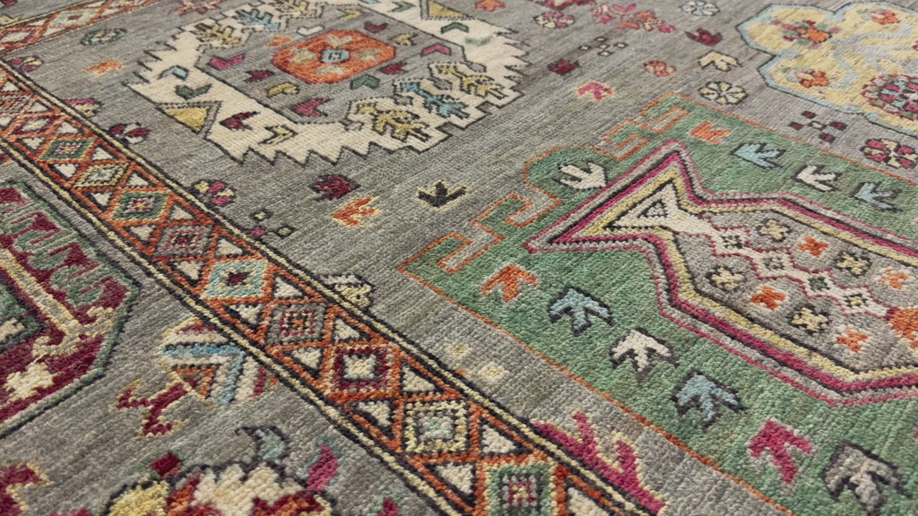 8x10 hand knotted colorful southwest wool rug with grey, green, berry red, orange, light blue, gold and beige.