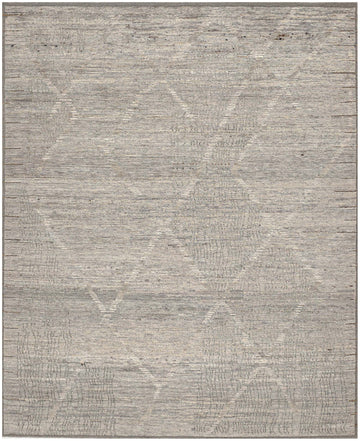 Veda VD-01 Storm – Hand-knotted wool rug with flowing trellis pattern in storm grey with tones of natural wool, earthy browns, soft blacks, and tints of green.