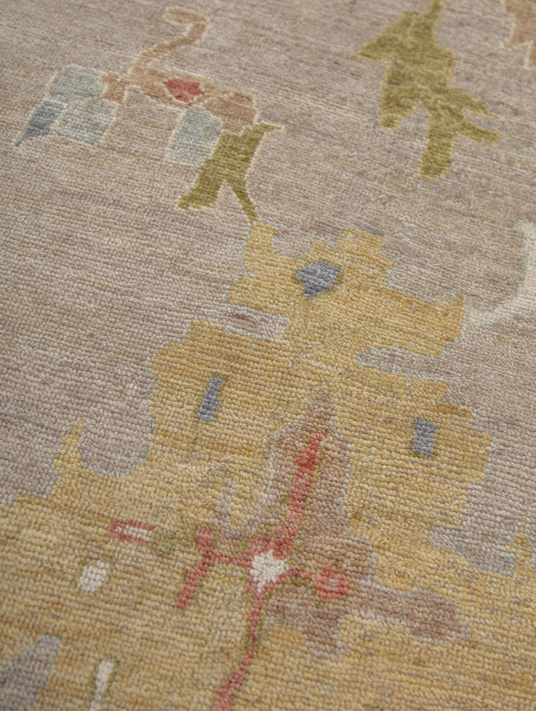 Hand Knotted handmade wool rug with turkish oushak pattern. Casual, pastel, melon tone colored rug. Traditional casual rug. Wool rug. 10' x 14' rug. 9'8" x 13'8" rug. Rug with ivory, white, blue, grey, gray, beige, tan, red, coral, green, sage, moss, gold, yellow, berry colors. One of a kind rug. available for quick ship. Charlotte NC rugs. Hickory, NC rugs. Hickory Furniture Mart Rugs.