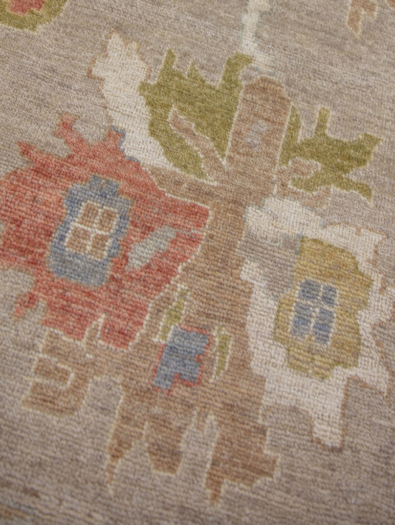 Hand Knotted handmade wool rug with turkish oushak pattern. Casual, pastel, melon tone colored rug. Traditional casual rug. Wool rug. 10' x 14' rug. 9'8" x 13'8" rug. Rug with ivory, white, blue, grey, gray, beige, tan, red, coral, green, sage, moss, gold, yellow, berry colors. One of a kind rug. available for quick ship. Charlotte NC rugs. Hickory, NC rugs. Hickory Furniture Mart Rugs.