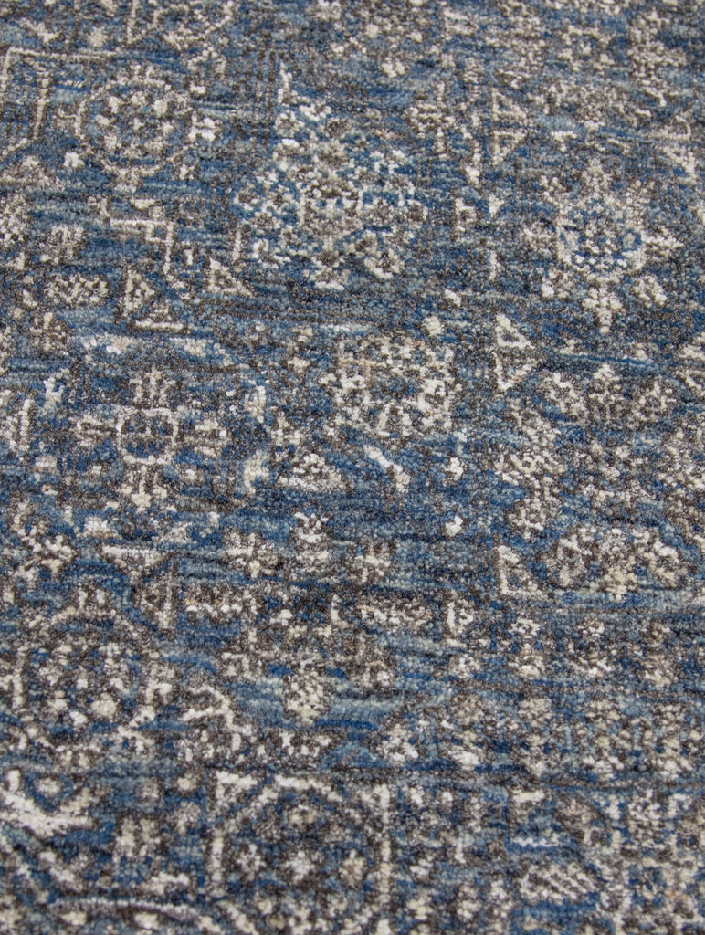Hand knotted by master weavers with 121 knots per square inch. Made of wool & Viscose with a cotton foundation. The Mani collection by Roya Rugs is durable, sustainable and meant to last for generations. Colors include denim, dark blue, light blue, Ivory, white, grey gray and brown. Khotan oushak ushak distressed transitional traditional and faded look. available in 2x3 and 9x12 and custom Roya Rugs