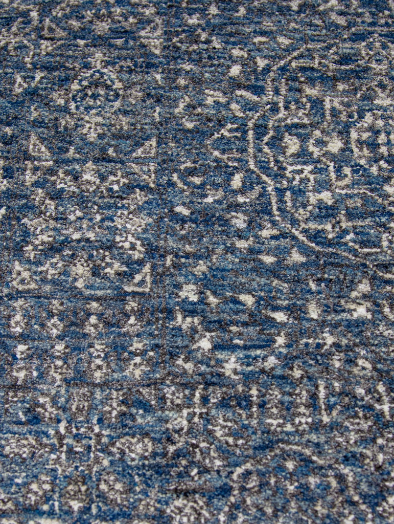 Hand knotted by master weavers with 121 knots per square inch. Made of wool & Viscose with a cotton foundation. The Mani collection by Roya Rugs is durable, sustainable and meant to last for generations. Colors include denim, dark blue, light blue, Ivory, white, grey gray and brown. Khotan oushak ushak distressed transitional traditional and faded look. available in 2x3 and 9x12 and custom Roya Rugs