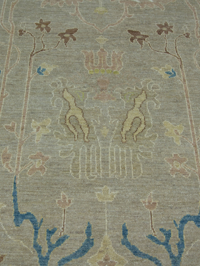 Luxury modern Turkish Oushak 9x12 wool rug in oriental design with beige/ivory and accent blue, ivory, blush, brown and citron colors.