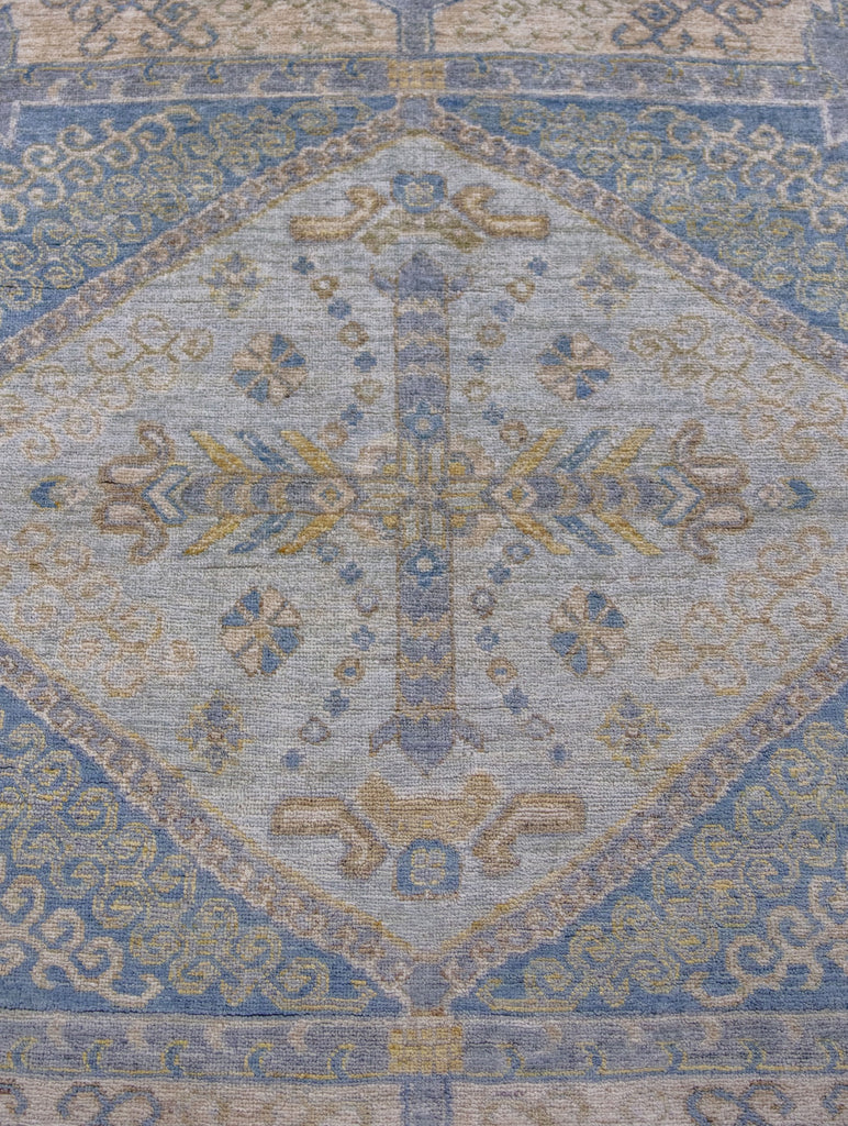 Luxury 9x12 hand knotted designer rug with large floral and geometric oriental design with colorful periwinkle purple, mustard yellow and accent beige, ivory, green and blue accents.
