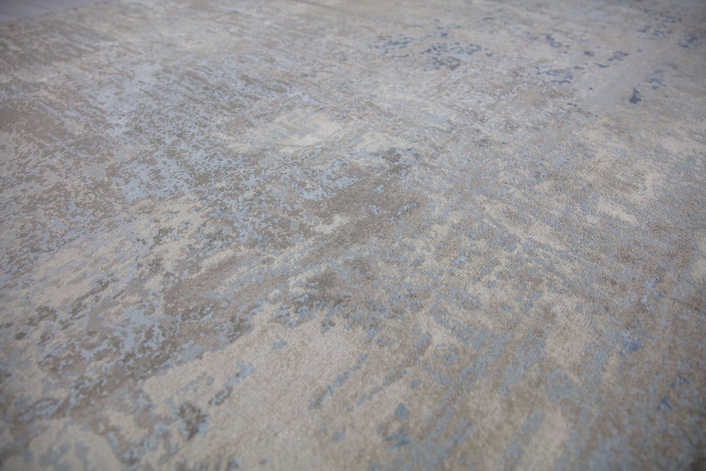 Roya Rugs cream and blue abstract contemporary wool rug.