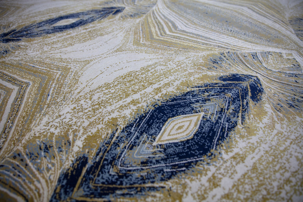 8x10 modern peacock kaleidoscope design hand knotted wool and silk rug with navy blue, light blue, pearl grey and dirty gold. 196 knots per square inch fine rug.