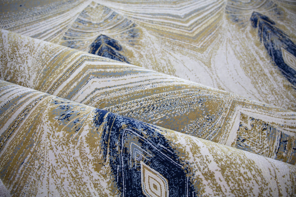 8x10 modern peacock kaleidoscope design hand knotted wool and silk rug with navy blue, light blue, pearl grey and dirty gold. 196 knots per square inch fine rug.
