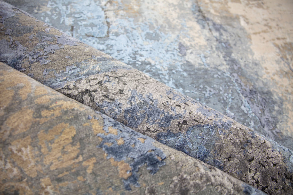 Beautiful modern abstract 8' x 10' hand-knotted blue and gray area rug with wool and bamboo silk. Accent beige, ivory and silver colors.