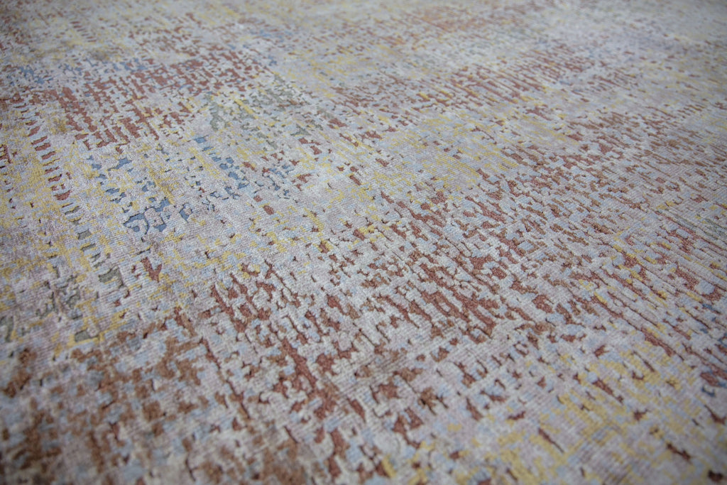hand knotted modern wool and bamboo silk 8x10 rug with texture, shimmer, and terracotta, red clay, beige, grey, silver, blue and gold color.