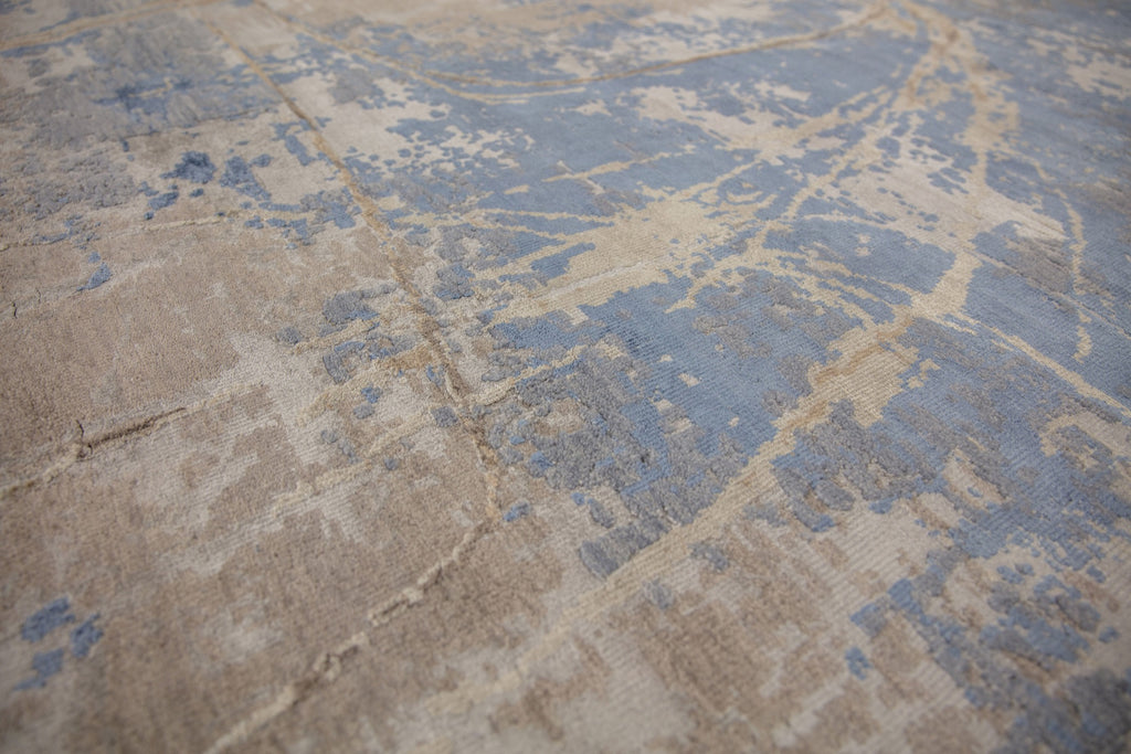 Modern abstract blue and brown 8x10 area rug hand-knotted of wool and bamboo silk with asymmetrical rug design. 