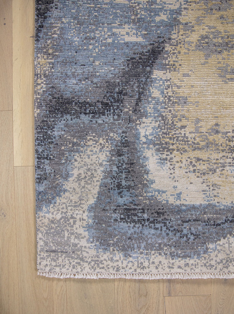 Modern 8x10 gray, blue and yellow hand knotted wool and silk area rug made in india with hand carved textured pile. Rugs as art.