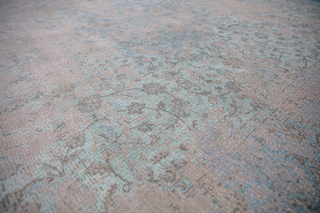 Aqua blue and sea foam green  8x10 hand knotted wool and pure silk pile area rug with a center medallion.