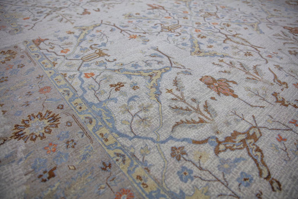 Roya Rugs Elke EL-02 colorful hand knotted modern distressed oriental turkish oushak wool rug with ivory, grey, orange, brown, beige/yellow, and light blue colors. Available in rug sizes 4x6, 8x10, 9x12, 10x14, 12x15 and large oversized 12x18.