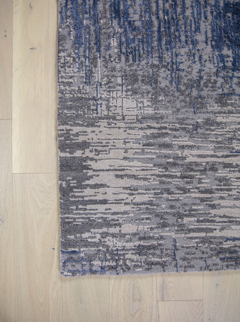 Hand knotted modern wool and bamboo silk rug 8x10 with texture soft pile and navy blue, ivory and warm grey colors.