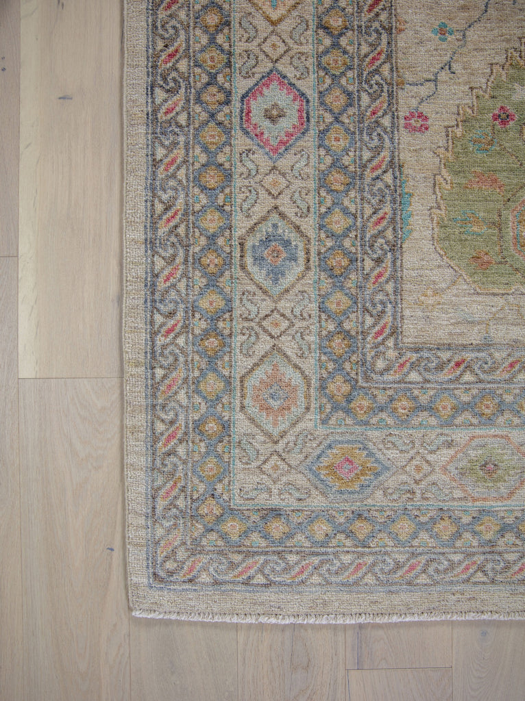 Avery AR-01 Ivory Hand Knotted Handmade Wool rug made in Pakistan with multiple colorful rug with green, yellow, gold, red, coral red, brown, seafoam, teal, aqua turquoise color area rug. Casual traditional roya rug. Sustainable organic fibers available in runners 4x6 5x7 6x9 8x10 9x12 10x14 12x15 12x18 and oversize and custom size rug