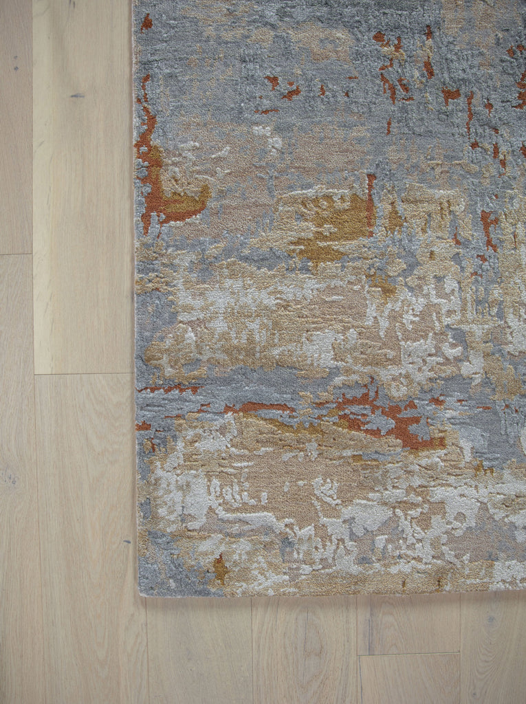 Essence ES-02 Grey/Ochre Hand Knotted handmade wool & silk rug. Luxury hand spun wool & silk rug that is durable and best for high traffic areas and rooms. Hand carved area rug. Performance and easy to clean rug. Colors include ochre, copper, penny, beige, brown, grey, gray, blue, slate blue, ivory, and white. Contemporary and abstract colorful handmade wool and silk rug. available in sizes 4x6, 8x10, 9x12, 10x14, 12x15, 12x18, oversized and custom. Available at Roya Rugs in Hickory, NC.
