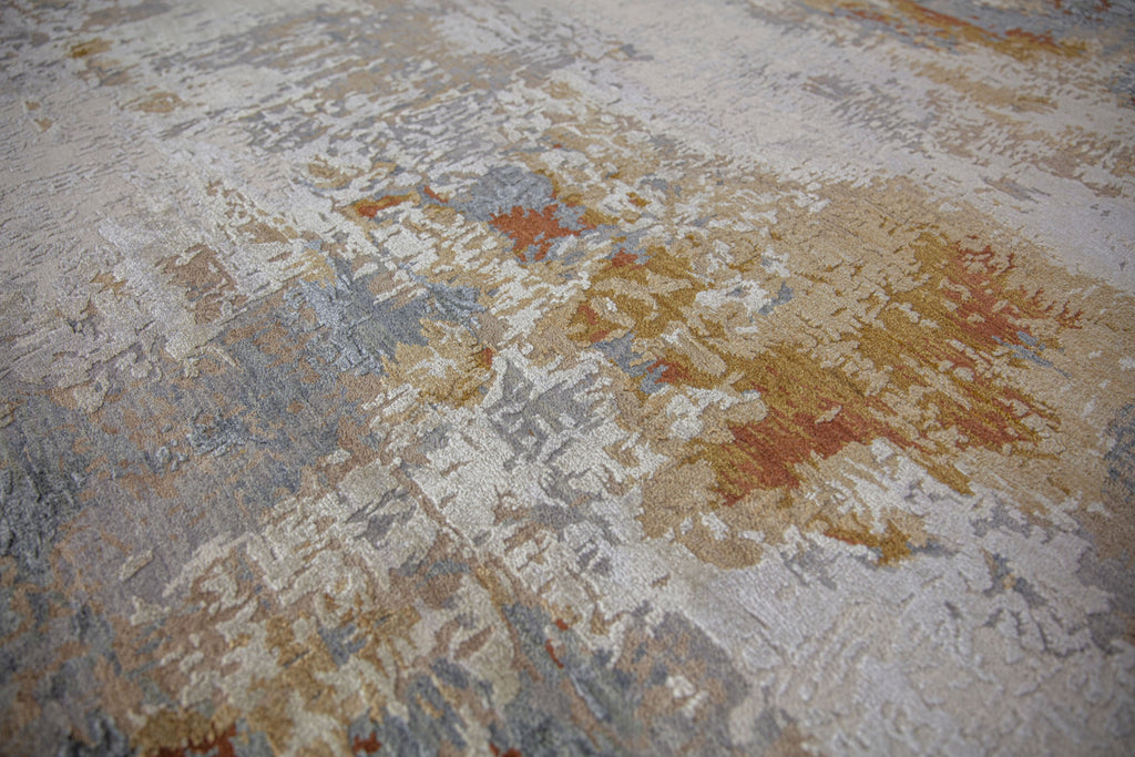 Essence ES-02 Grey/Ochre Hand Knotted handmade wool & silk rug. Luxury hand spun wool & silk rug that is durable and best for high traffic areas and rooms. Hand carved area rug. Performance and easy to clean rug. Colors include ochre, copper, penny, beige, brown, grey, gray, blue, slate blue, ivory, and white. Contemporary and abstract colorful handmade wool and silk rug. available in sizes 4x6, 8x10, 9x12, 10x14, 12x15, 12x18, oversized and custom. Available at Roya Rugs in Hickory, NC.