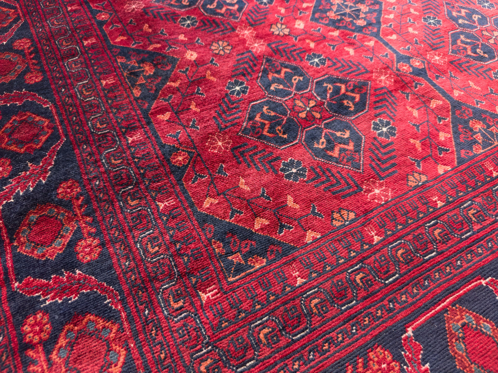 Roya Rugs 5x7 red area rug with dark maroon and midnight blue oriental geometric new tribal Persian wool rug for home and rugs North Carolina Asheville, Raleigh, Marvin, Hickory, Denver NC and Banner Elk rugs.